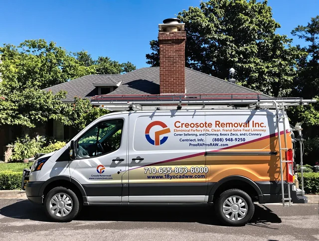 Orange Chimney Sweep technician removing creosote safely in Orange, CA