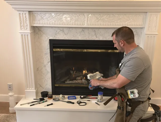 Orange Chimney Sweep performing fireplace maintenance in Orange, CA