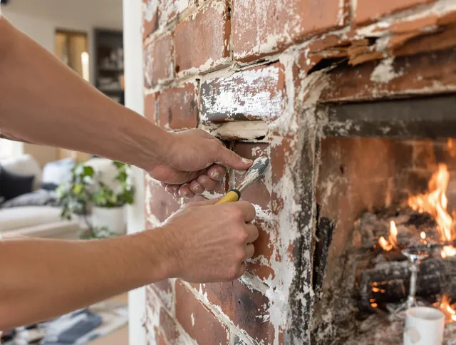 Routine fireplace repair by Orange Chimney Sweep in Orange, CA